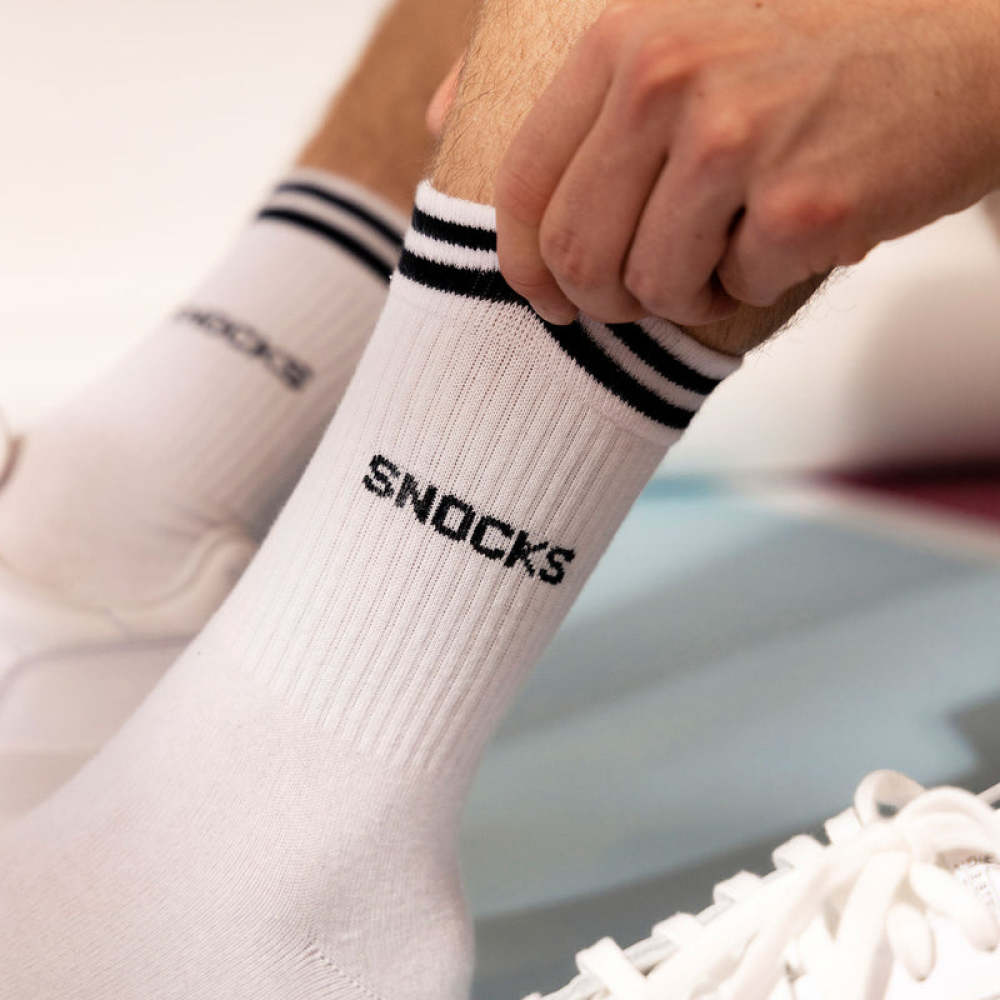 Hohe Sportsocken mit Streifen aus Bio-Baumwolle Schwarz